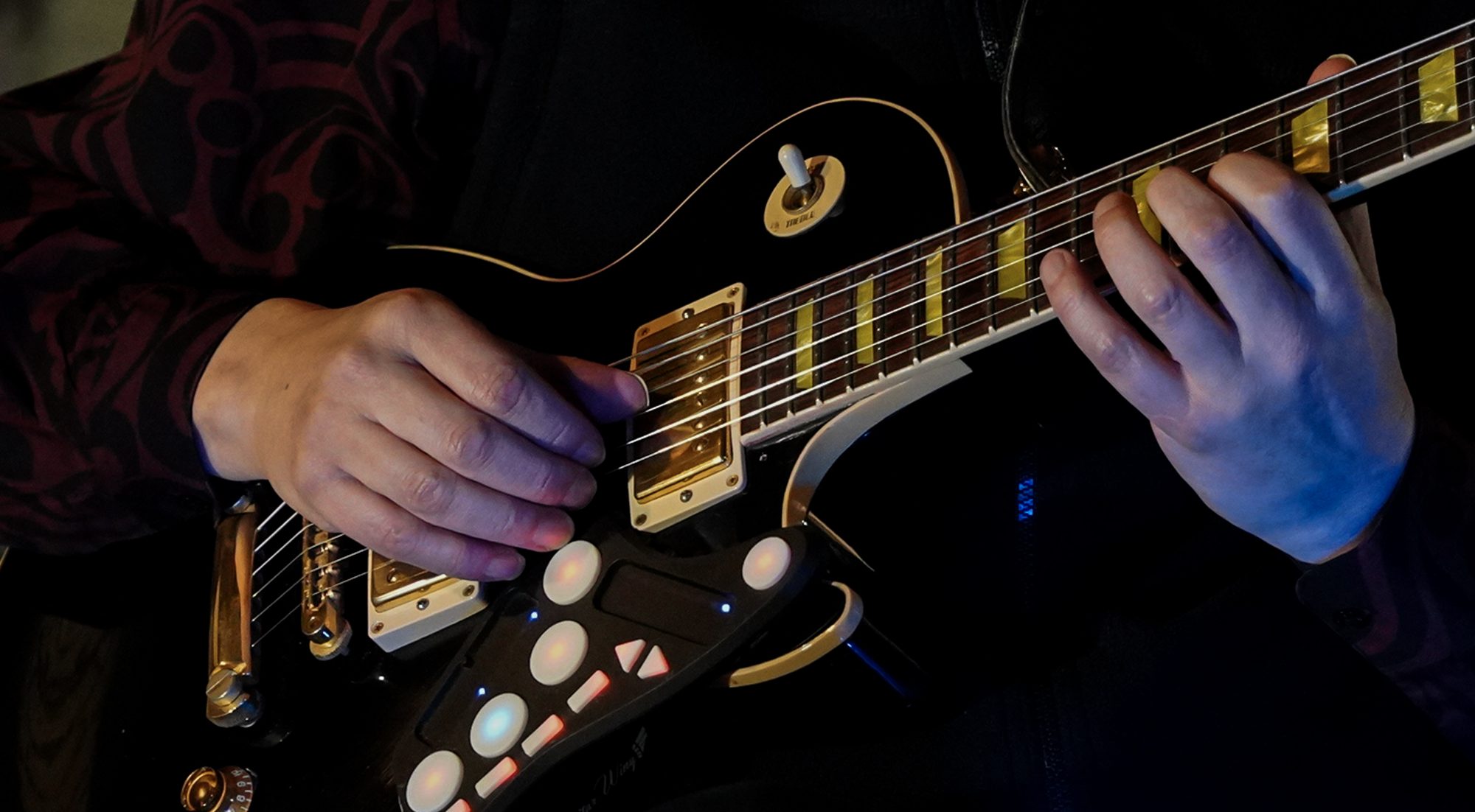 Tony Geballe playing electric guitar